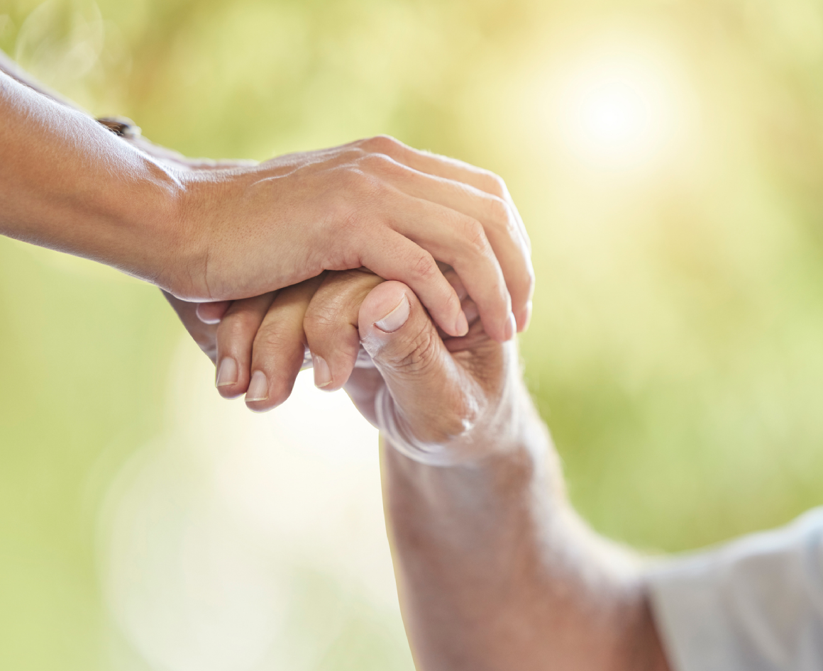 Hands holding each other gently