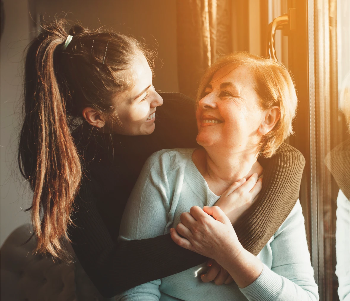 Mother and daughter sharing a warm embrace